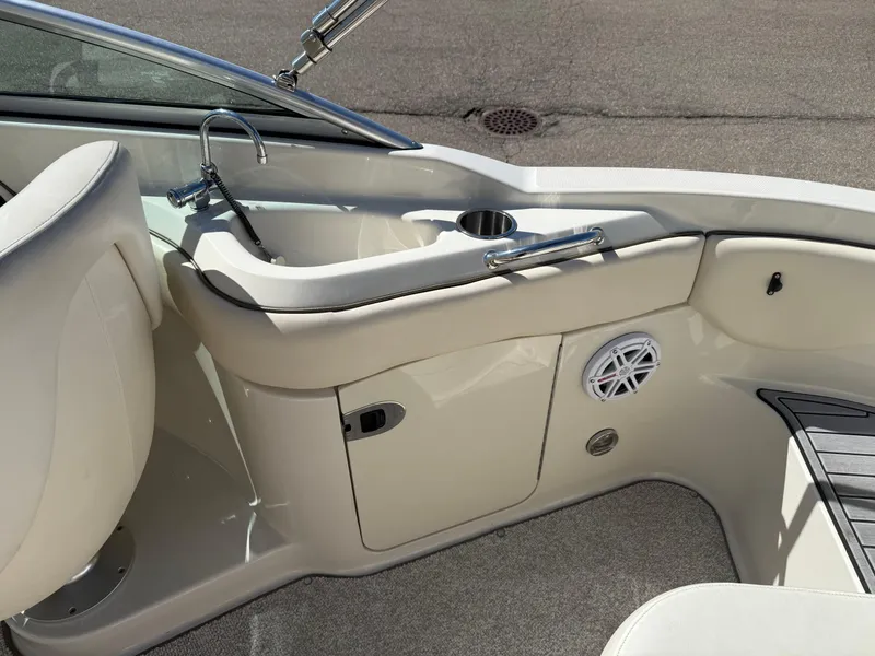 Slide: The Image of Interior of 2008 Sea Ray 220 boat with sink and speaker. - 9