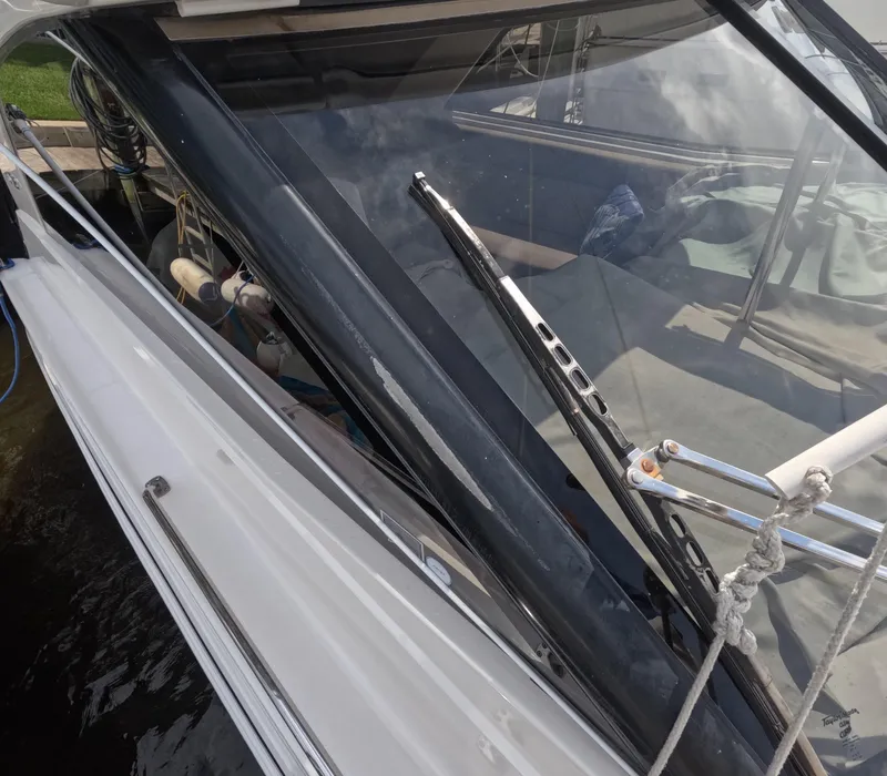 Slide: The Image of 2015 Regal 35 Sport Coupe boat windshield and deck view. - 29