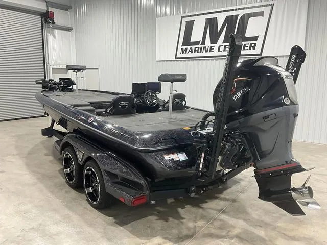 Slide: The Image of 2022 Skeeter FXR21 Select boat in showroom, featuring Yamaha outboard motor. - 4