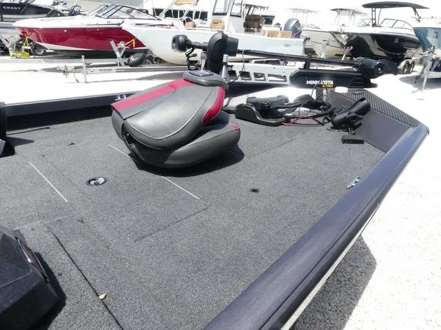 Slide: The Image of 2019 Ranger RT178C boat interior with seating and fishing equipment. - 7