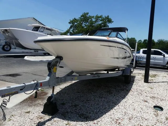 Slide: The Image of 2017 Sea Ray SPX 190 OB boat on trailer, parked outdoors. - 2