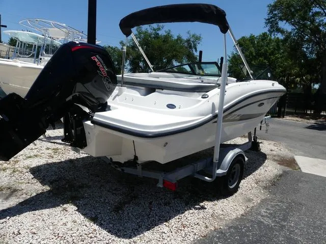 Slide: The Image of 2017 Sea Ray SPX 190 OB boat on trailer, parked outdoors. - 3