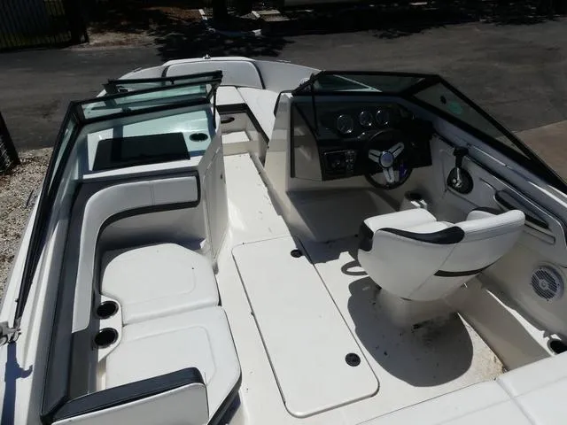 Slide: The Image of 2017 Sea Ray SPX 190 OB boat interior with seating and steering console. - 5
