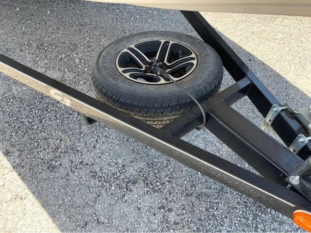Slide: The Image of Spare tire mounted on a 2015 G3 Eagle Talon 17 DLX trailer frame. - 11