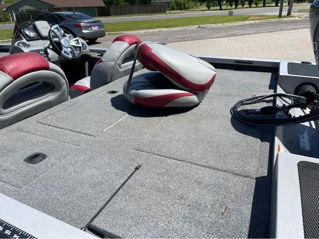 Slide: The Image of 2015 G3 Eagle Talon 17 DLX boat interior with gray and red seating. - 6