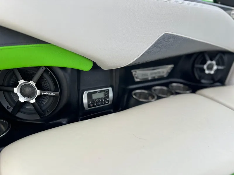 Slide: The Image of Interior of 2014 Supra SA450 with Polk Audio speakers and control panel. - 10