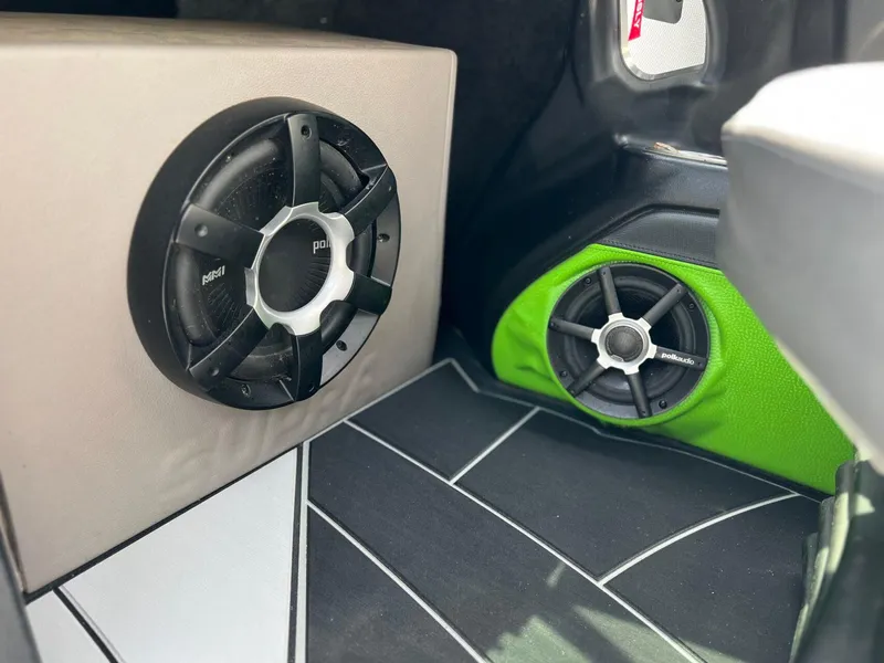 Slide: The Image of Speakers in a 2014 Supra SA450 boat, featuring Polk Audio components. - 18