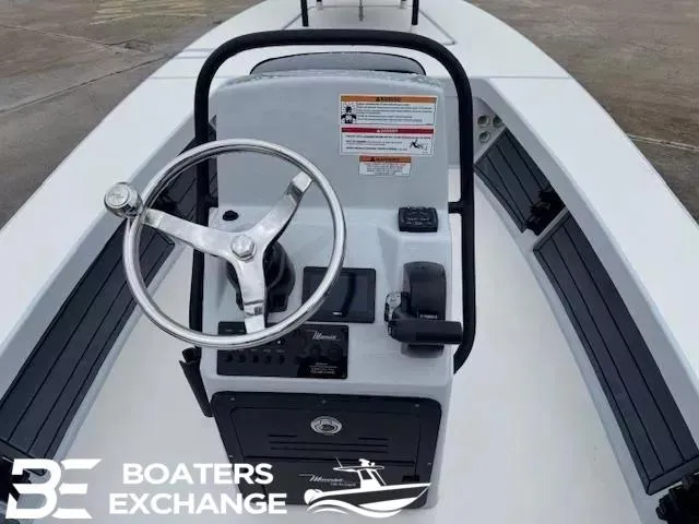 Slide: The Image of 2025 Maverick HPX-V 18 boat console with steering wheel and controls, Boaters Exchange logo. - 7