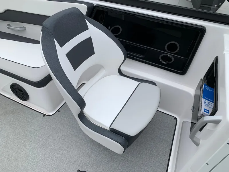 Slide: The Image of 2023 Yamaha Boats SX195 interior with sleek seating and modern dashboard design. - 24