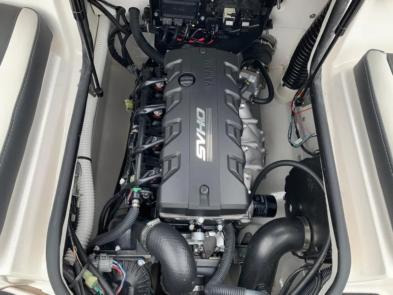 Slide: The Image of 2023 Yamaha SX195 engine compartment showcasing SVHO engine components and wiring. - 29