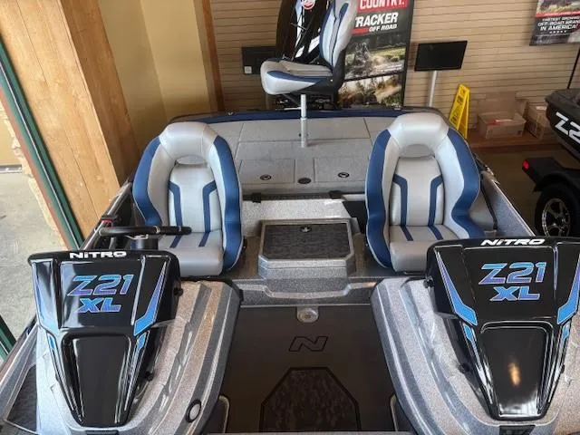 Slide: The Image of 2025 Nitro Z21 XL boat interior with dual seats and sleek design. - 6