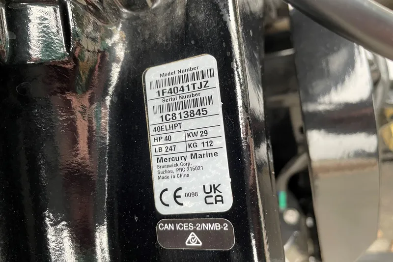 Slide: The Image of Label on a 2025 Tracker Super Guide V-16 T, showing model and serial numbers. - 34