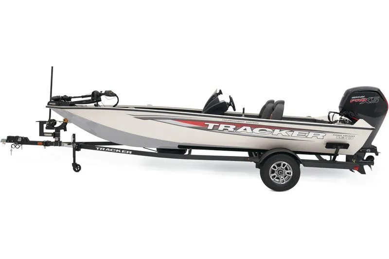 Slide: The Image of 2025 Tracker Pro Team 190 boat with Mercury engine, parked on a road. - 3