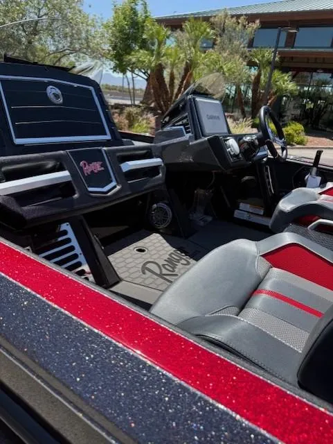 Slide: The Image of 2025 Ranger Z521R boat interior with sleek dashboard and comfortable seating. - 6