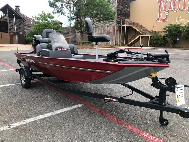 Slide: The Image of 2025 Tracker Bass Tracker Classic XL boat on trailer, parked outdoors. - 6
