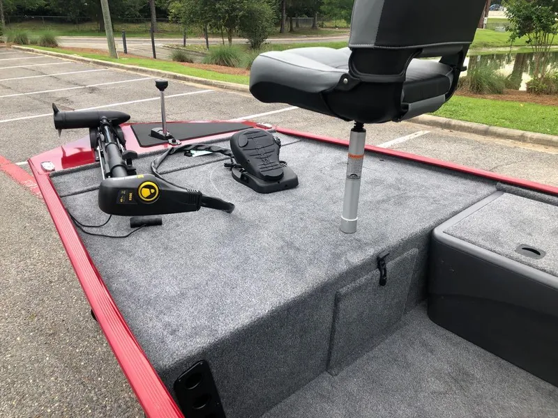 Slide: The Image of 2025 Tracker Bass Tracker Classic XL boat interior with seat and trolling motor. - 8