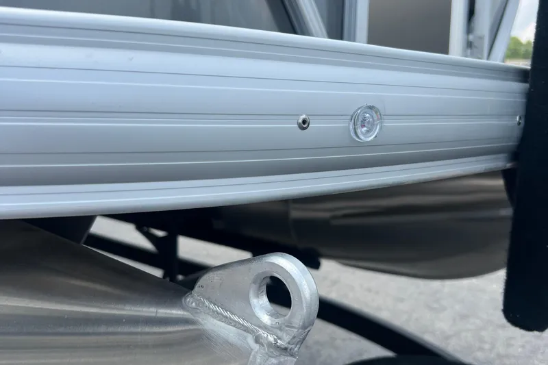 Slide: The Image of Close-up of 2025 Sun Tracker Party Barge 20 DLX pontoon detail, showcasing aluminum construction. - 8
