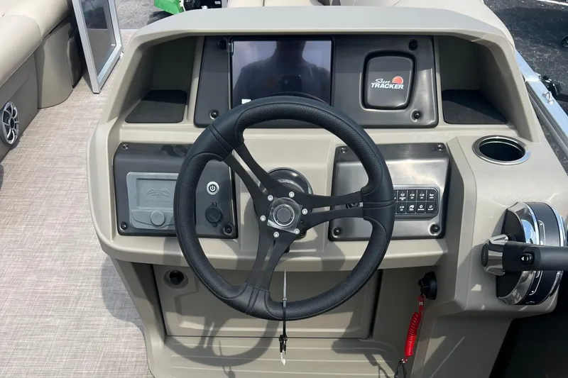 Slide: The Image of Steering console of 2025 Sun Tracker Party Barge 20 DLX pontoon boat. - 9