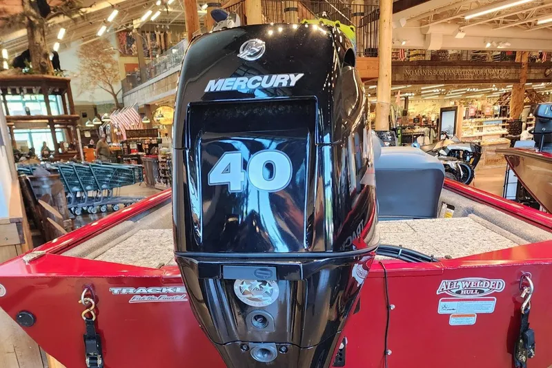 Slide: The Image of 2025 Tracker Pro 170 boat with Mercury 40 engine in showroom. - 4
