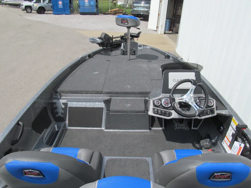 Slide: The Image of 2025 Ranger Z185 boat interior with steering wheel, seats, and control panel. - 5