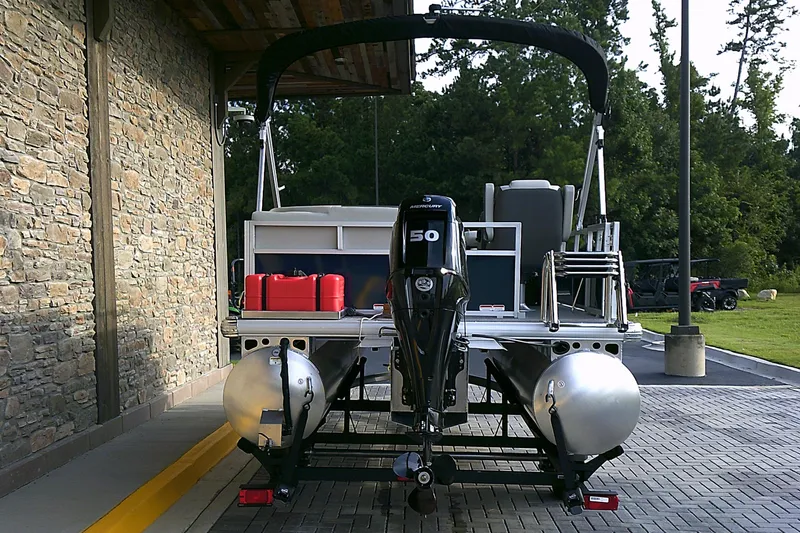 Slide: The Image of 2025 Sun Tracker Bass Buggy 16 XL Select pontoon boat with Mercury 50 engine. - 3