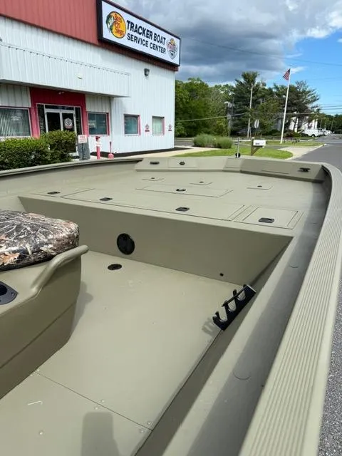 Slide: The Image of 2025 Tracker Grizzly 2072 CC boat at service center, exterior view. - 7