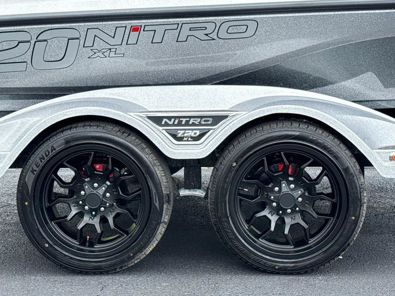 Slide: The Image of 2025 Nitro Z20 XL trailer with dual black wheels and sleek design. - 5