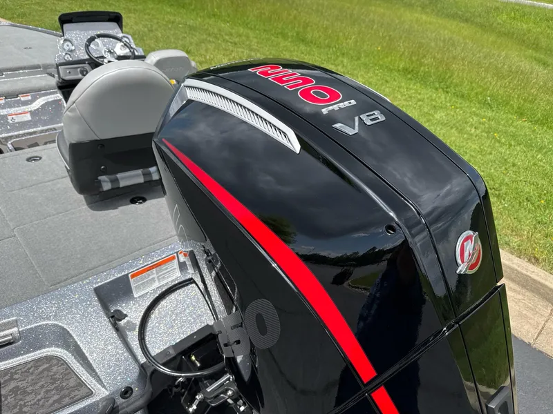 Slide: The Image of 2025 Nitro Z20 XL boat with powerful V8 engine, sleek black and red design. - 6