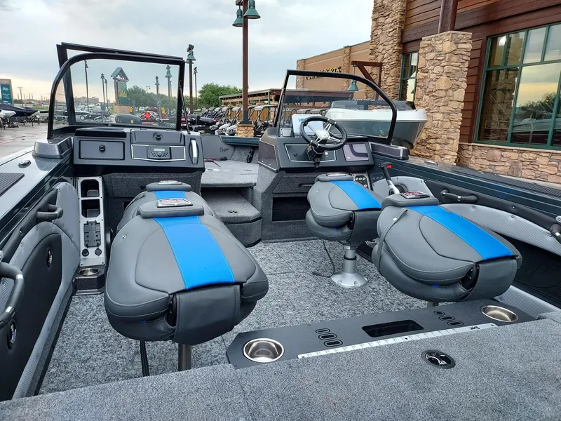 Slide: The Image of 2025 Ranger VX1788 WT boat interior with modern seating and dashboard. - 39
