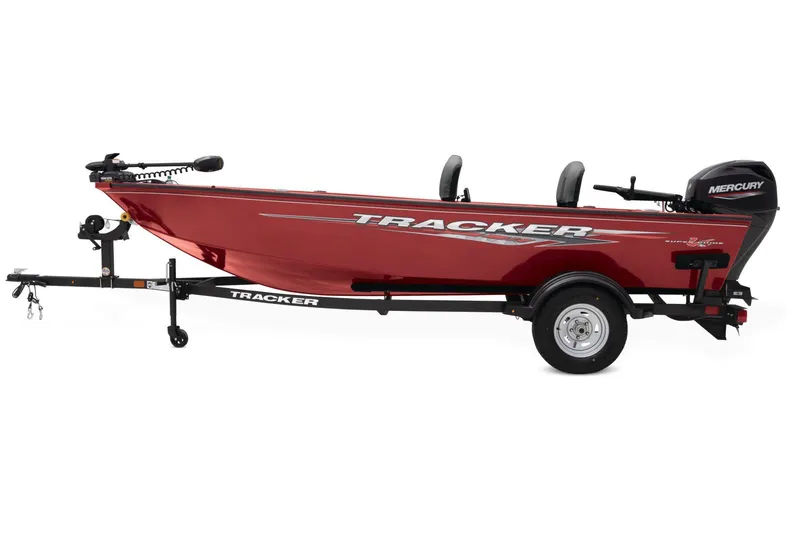 Slide: The Image of 2025 Tracker Super Guide V-16 T boat displayed in a showroom with other boats. - 2