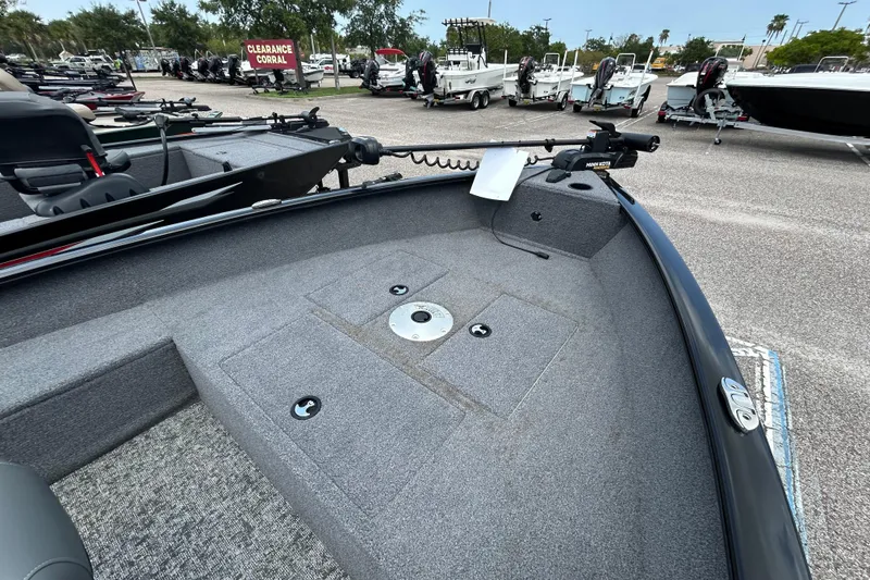Slide: The Image of 2025 Tracker Super Guide V-16 T boat interior at clearance sale, featuring spacious deck layout. - 6