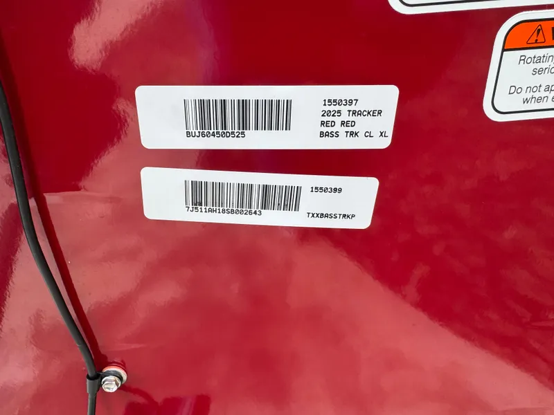 Slide: The Image of 2025 Tracker Bass Tracker Classic XL, red exterior with barcode labels. - 4