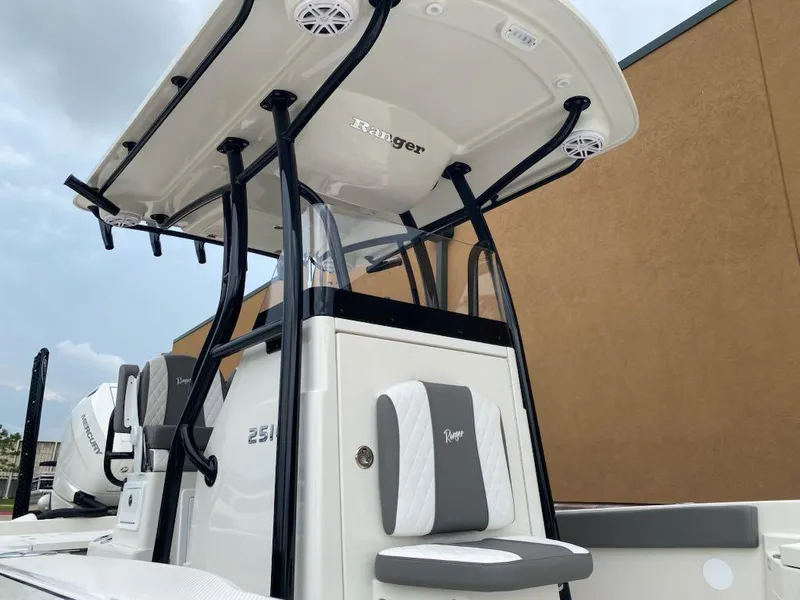 Slide: The Image of 2025 Ranger 2510 Bay boat with sleek design and modern seating. - 9