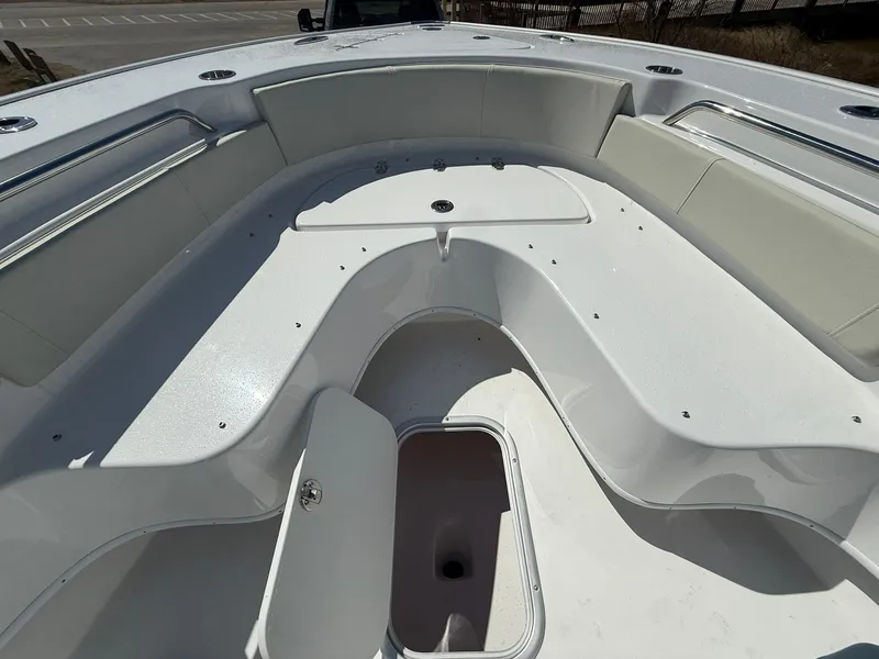 Slide: The Image of 2025 Cape Horn 24 XS boat interior with spacious seating and storage compartments. - 30