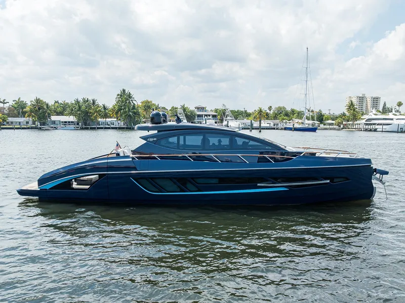 The Image of 2023 Lazzara LSX 67 yacht on calm water, sleek design, sunny day. - 1
