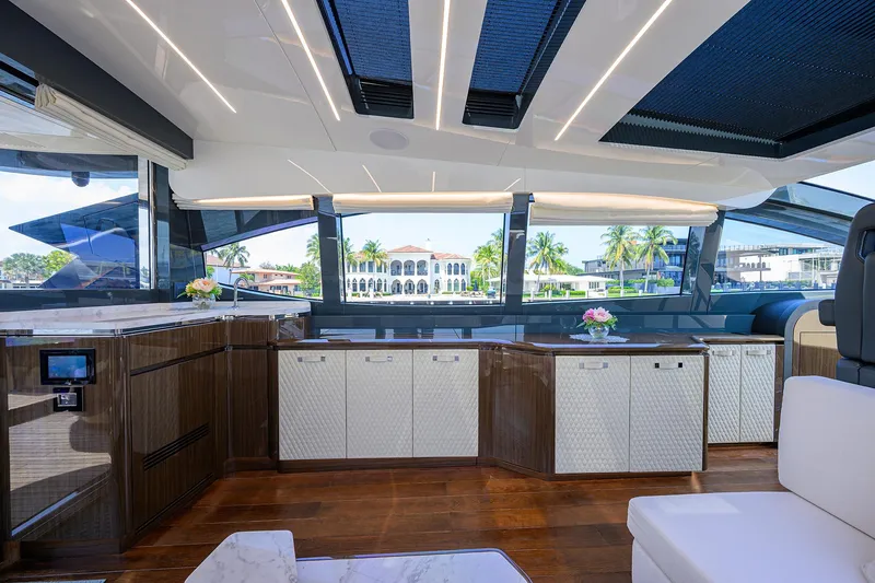 Slide: The Image of Luxurious interior of 2023 Lazzara LSX 67 yacht with modern design and panoramic windows. - 14
