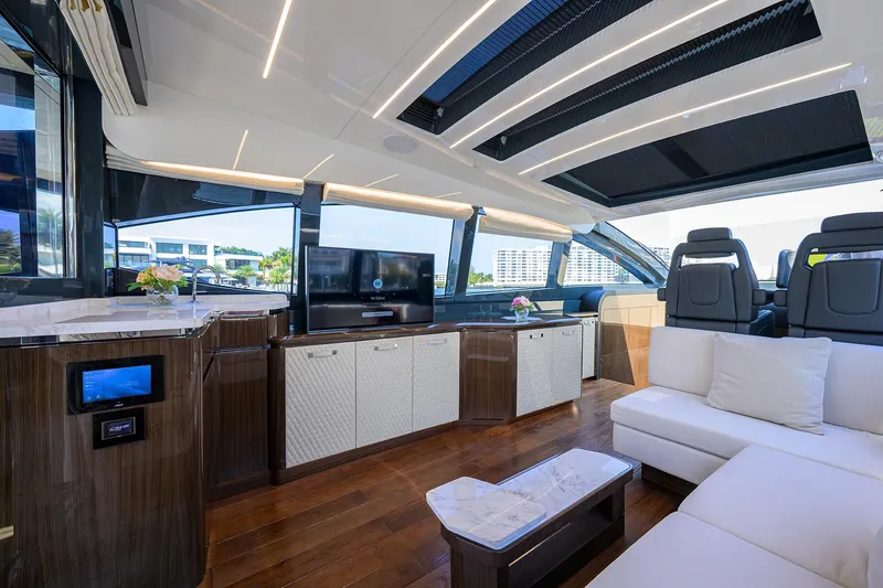 Slide: The Image of Luxurious interior of 2023 Lazzara LSX 67 yacht with modern furnishings and sleek design. - 15