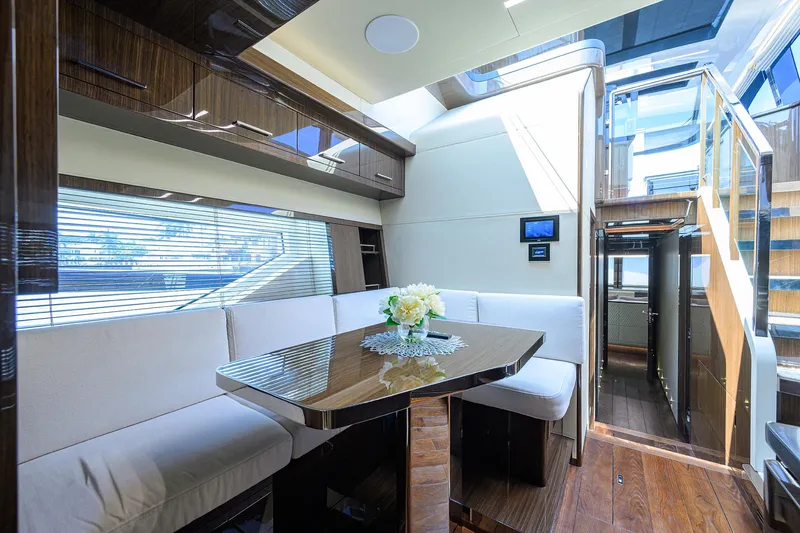 Slide: The Image of Luxurious interior of 2023 Lazzara LSX 67 yacht with elegant seating and modern design. - 22