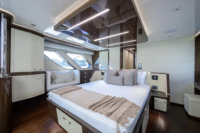 Slide: The Image of Luxurious bedroom interior of 2023 Lazzara LSX 67 yacht with modern design and elegant furnishings. - 26