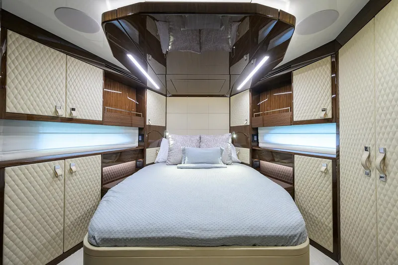 Slide: The Image of Luxurious bedroom interior of 2023 Lazzara LSX 67 yacht with elegant design and ambient lighting. - 28