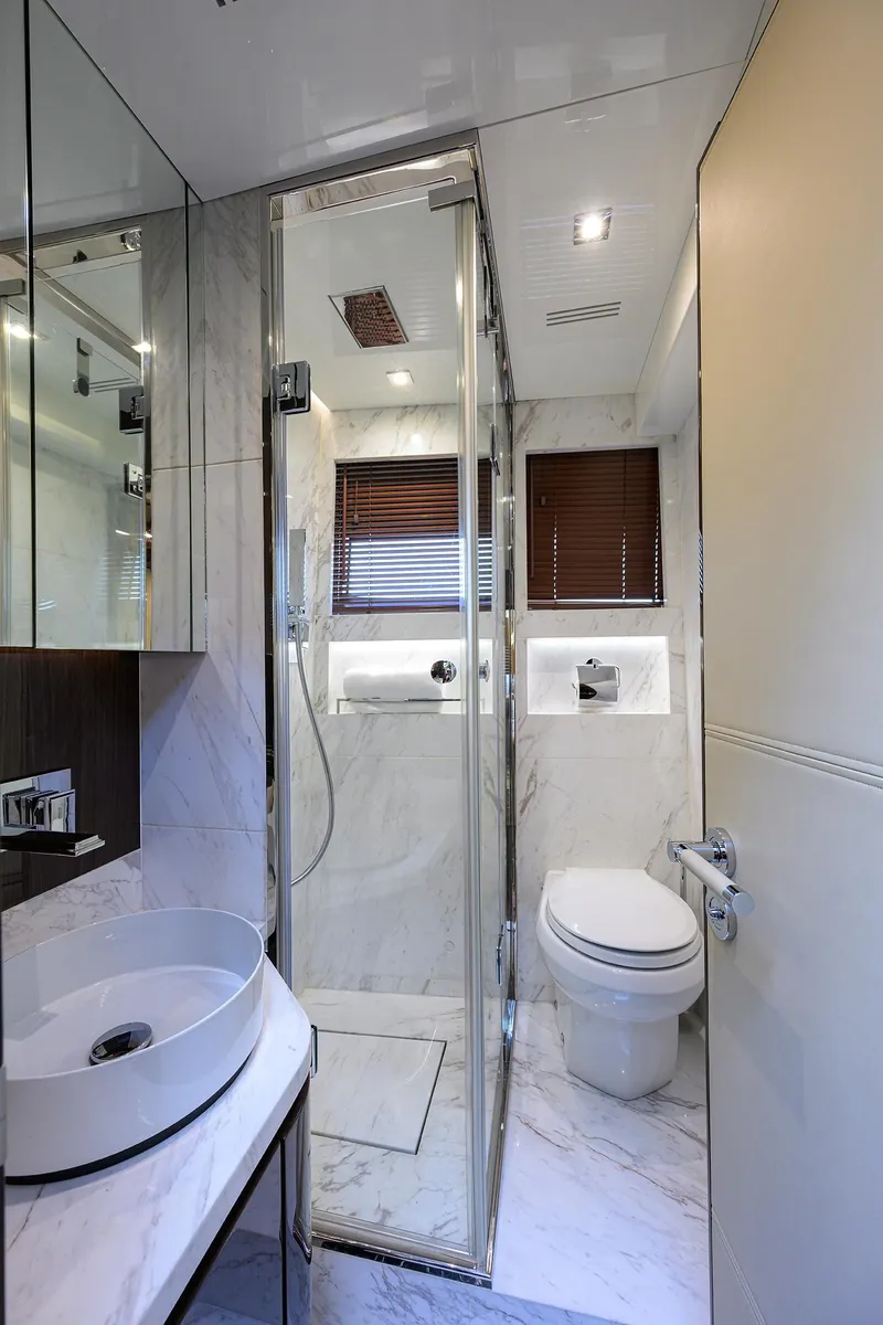 Slide: The Image of Luxurious bathroom in 2023 Lazzara LSX 67 yacht with modern fixtures and elegant design. - 33