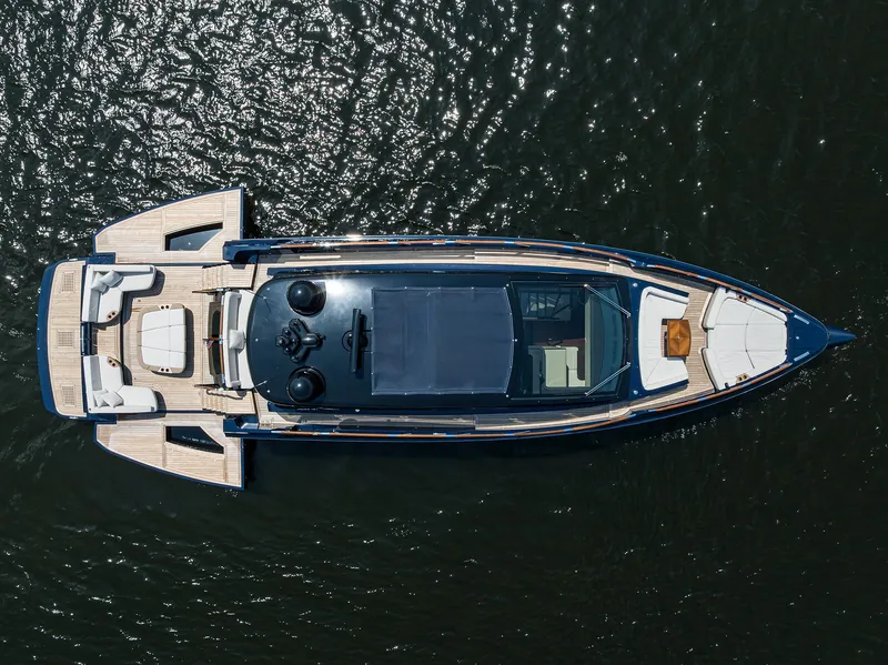 Slide: The Image of Aerial view of 2023 Lazzara LSX 67 luxury yacht on water. - 4