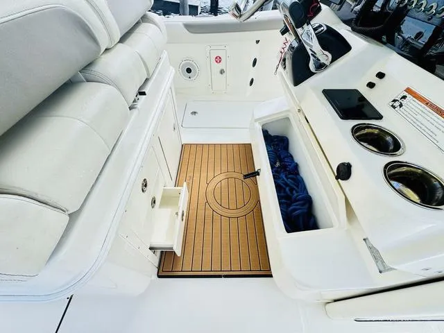 Slide: The Image of Interior of a 2020 World Cat 32 boat with seating and storage compartments. - 19