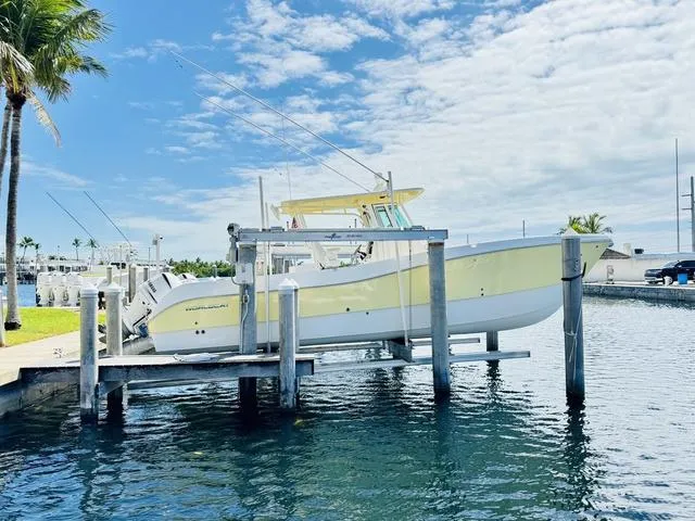 Slide: The Image of 2020 World Cat 32 boat docked on a sunny day with clear skies. - 37