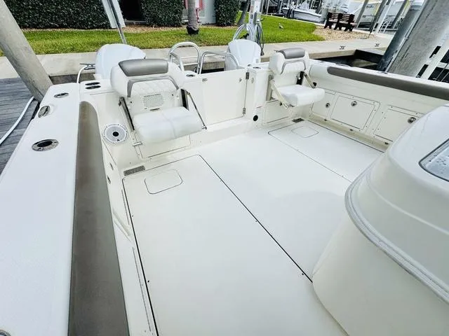 Slide: The Image of 2020 World Cat 32 boat interior with spacious seating and storage compartments. - 6