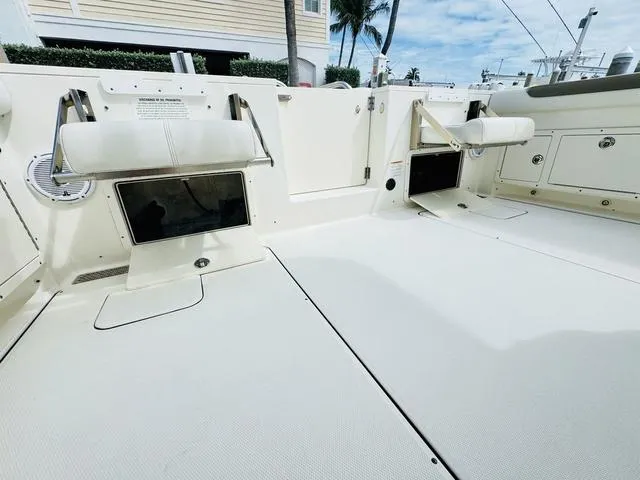 Slide: The Image of 2020 World Cat 32 boat interior with seating and storage compartments. - 7