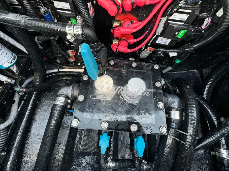 Slide: The Image of Engine compartment of 2025 Yellowfin 34 Offshore boat with wiring and components. - 31