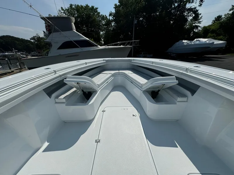 Slide: The Image of 2025 Yellowfin 34 Offshore boat with spacious seating and sleek design. - 32