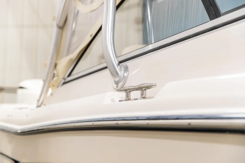 Slide: The Image of 2011 Grady-White Tournament 225 boat detail, featuring sleek design and stainless steel fittings. - 19