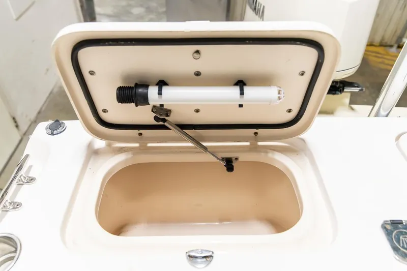 Slide: The Image of Open storage compartment on 2011 Grady-White Tournament 225 boat. - 40